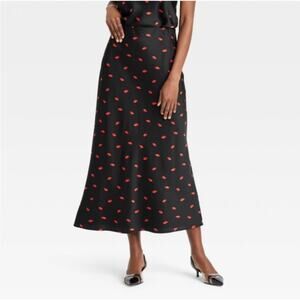 A New Day black satin midi A-line skirt featuring a vibrant red lip pattern 2X
